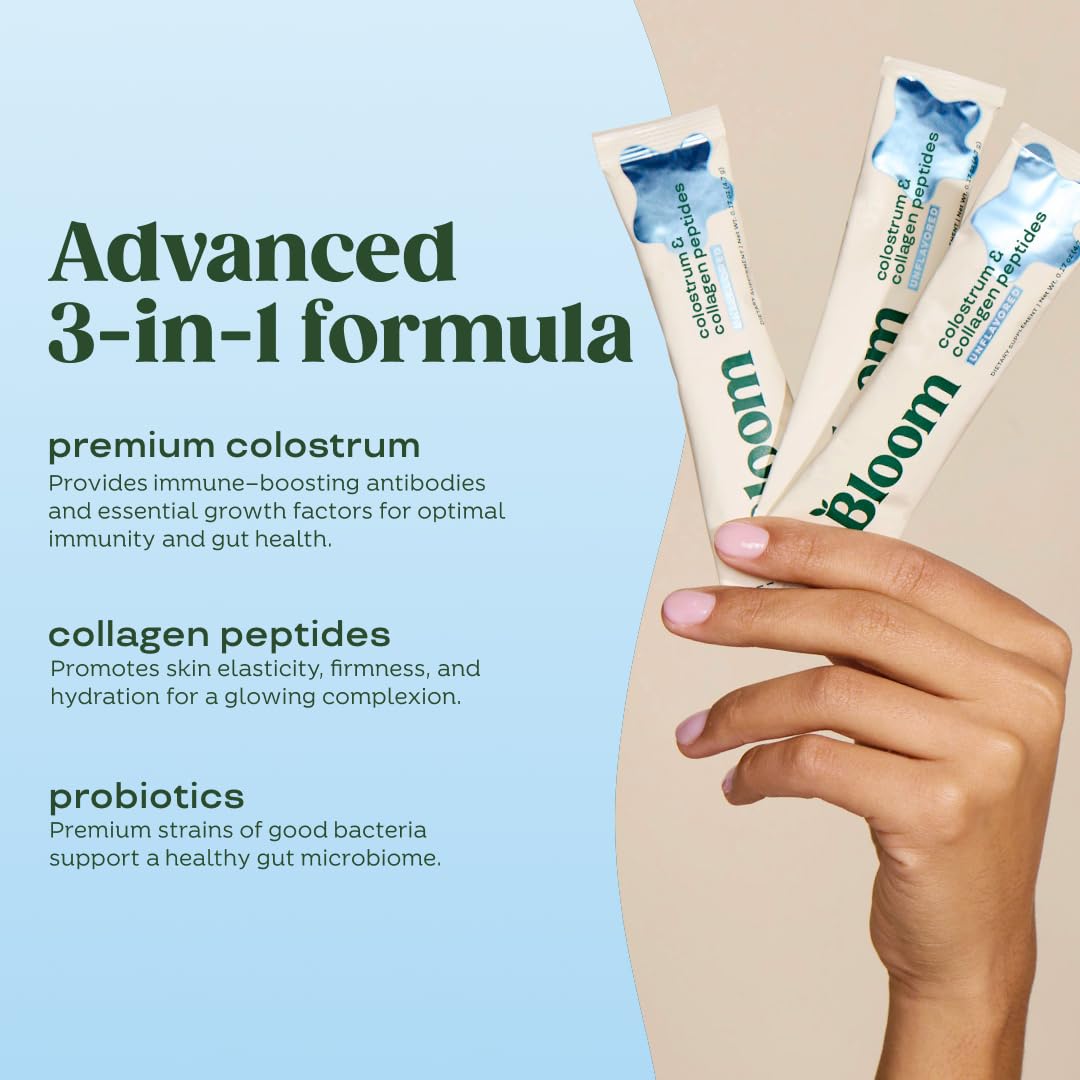 Poudre de colostrum bovin Bloom Nutrition avec une cuillère
