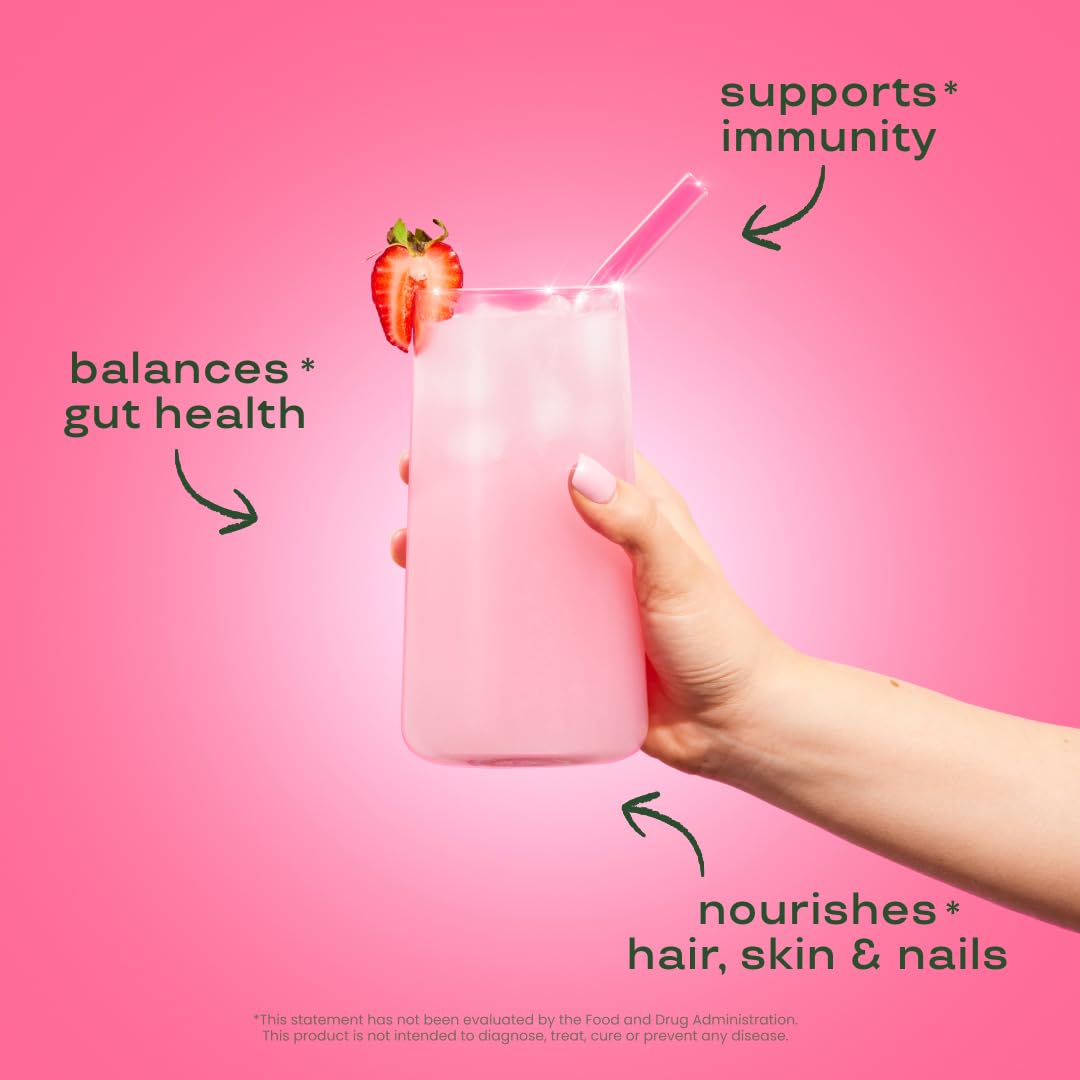 Poudre de colostrum bovin Bloom Nutrition dans un verre avec une cuillère