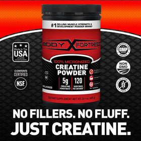 Poudre de créatine Body Fortress dans une cuillère