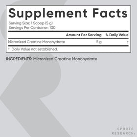 Poudre de créatine monohydrate Sports Research sur une table