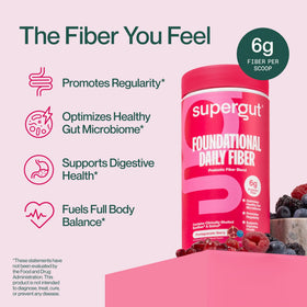 Poudre de fibres Supergut avec cuillère dans un verre d'eau
