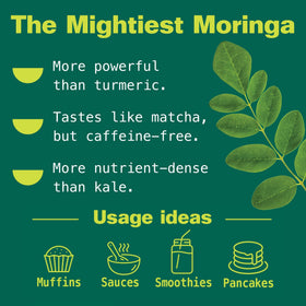 Poudre de Moringa Kuli Kuli sur une table avec fruits