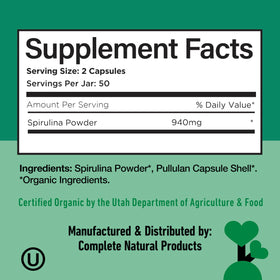 Poudre de Spiruline Bleue Hawaïenne 470mg - gélules sur une surface en bois