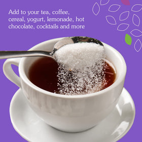 Poudre de stevia blanche Nunaturals sur des fruits