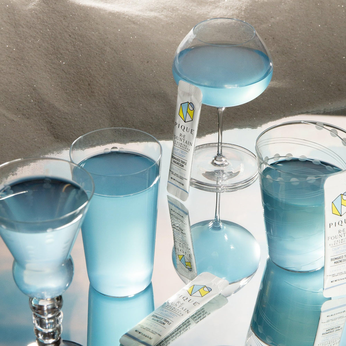 Poudre Électrolyte PIQUE ouverte avec une cuillère