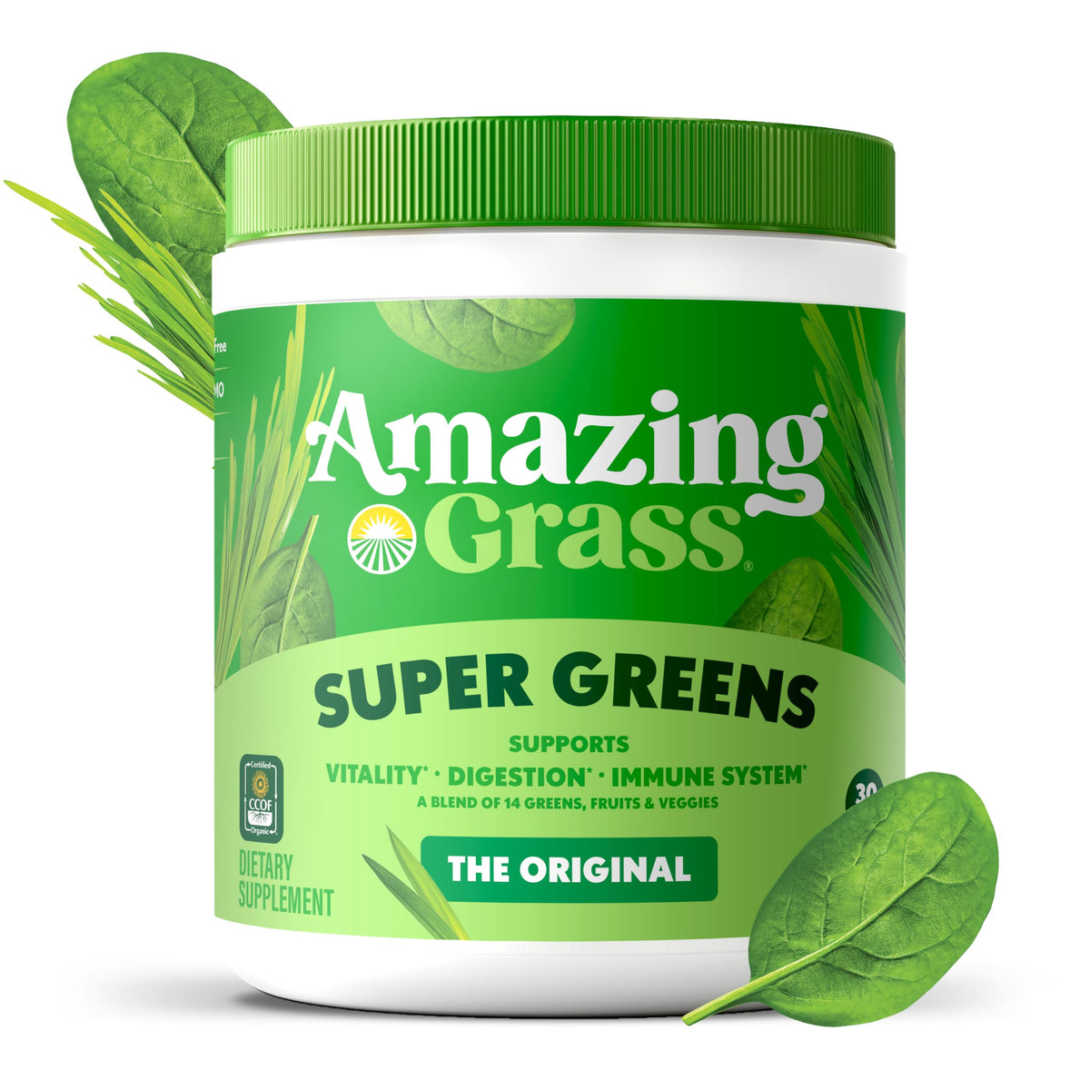 Poudre Super Greens Amazing Grass à côté d'un bol de fruits