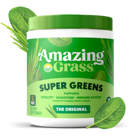 Poudre Super Greens Amazing Grass à côté d'un bol de fruits