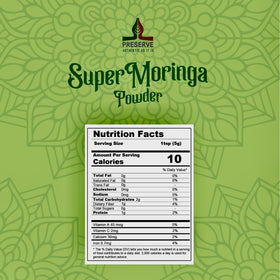 PRESERVE Poudre de Moringa Pure 113g sur une table en bois