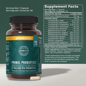 Primal Harvest Probiotic capsules sur une surface en bois
