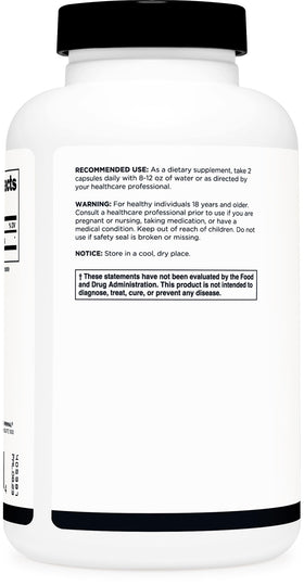 Primal L-Citrulline capsules sur une surface blanche