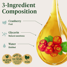 Prise du complément HERBAMAMA Cranberry avec verre d'eau