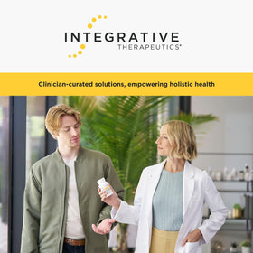 Probiotic Pearls d'Integrative Therapeutics sur une table en bois