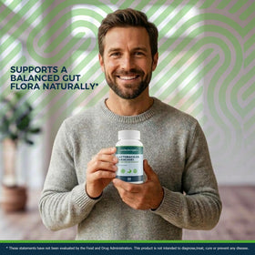 Probiotiques Lactobacillus Paracasei avec capsules sur fond neutre