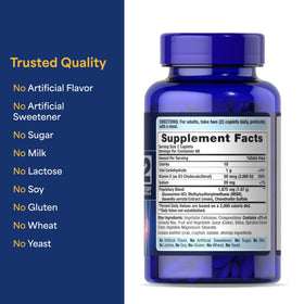 Puritan's Pride Glucosamine Chondroïtine MSM caplets in a hand