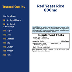 Puritan's Pride Red Yeast Rice 600mg capsules on a wooden table