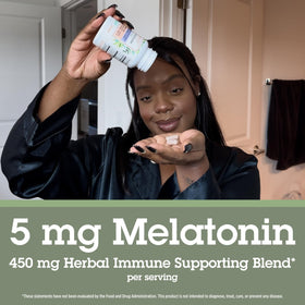 Quantum Complément Alimentaire Sommeil 5mg Mélatonine capsules sur une table