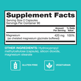 Qunol Magnésium 420mg capsules sur un fond en bois