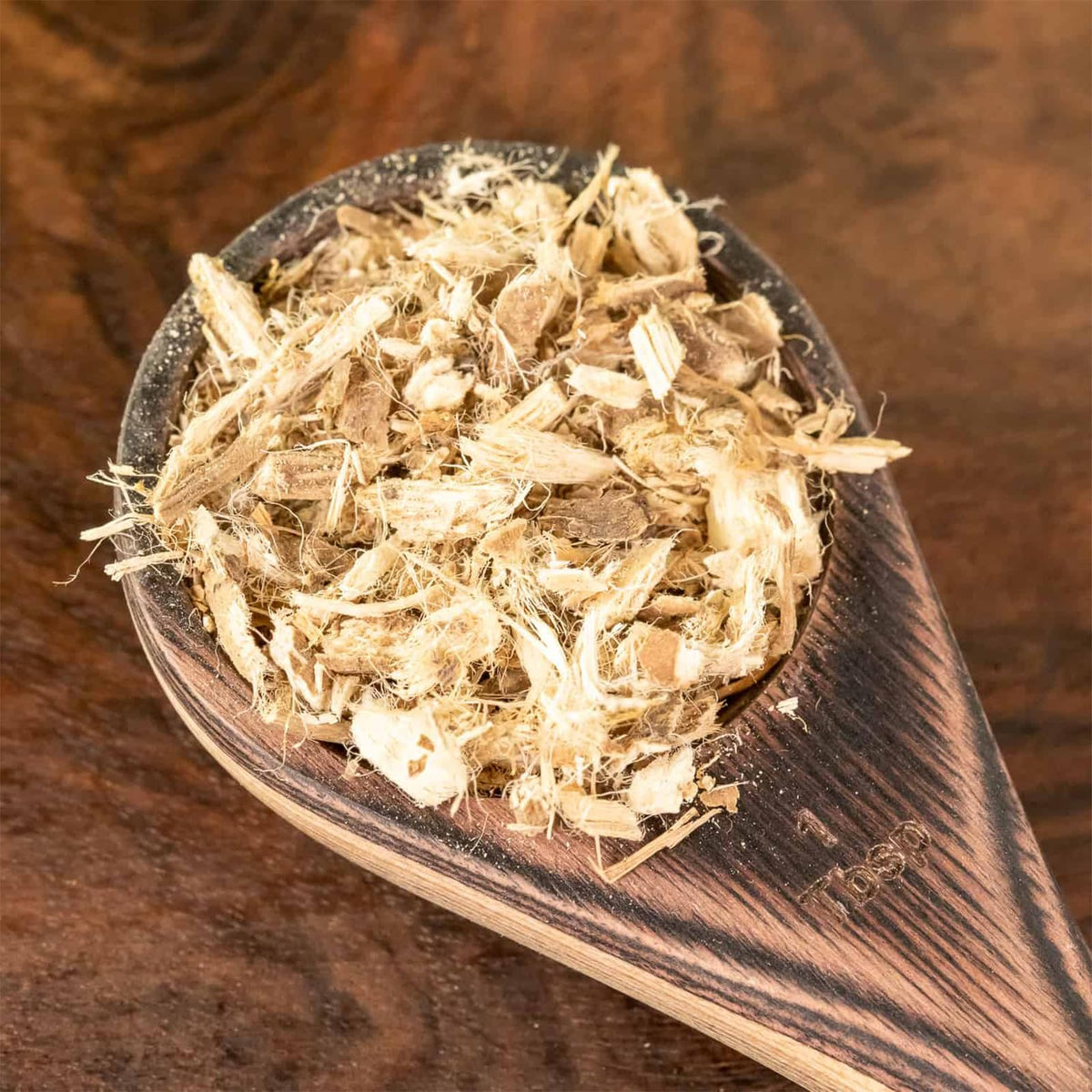 Racine de guimauve bio wid Pure sur une table en bois