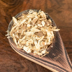 Racine de guimauve bio wid Pure sur une table en bois