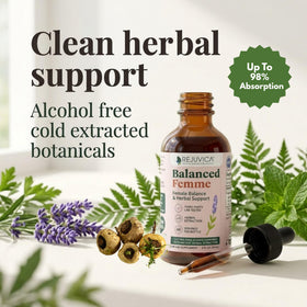 Rejuvica Health Balanced Femme goutte sur une cuillère en bois