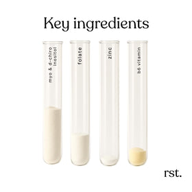 reset wellness MYOINOSITOL+ capsules à côté d'une cuillère