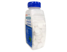 RUGBY LABORATORIES Calcium Carbonate 500mg comprimés à mâcher menthe avec un verre d'eau