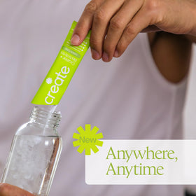 Sachet de Create Créatine ouvert montrant le contenu