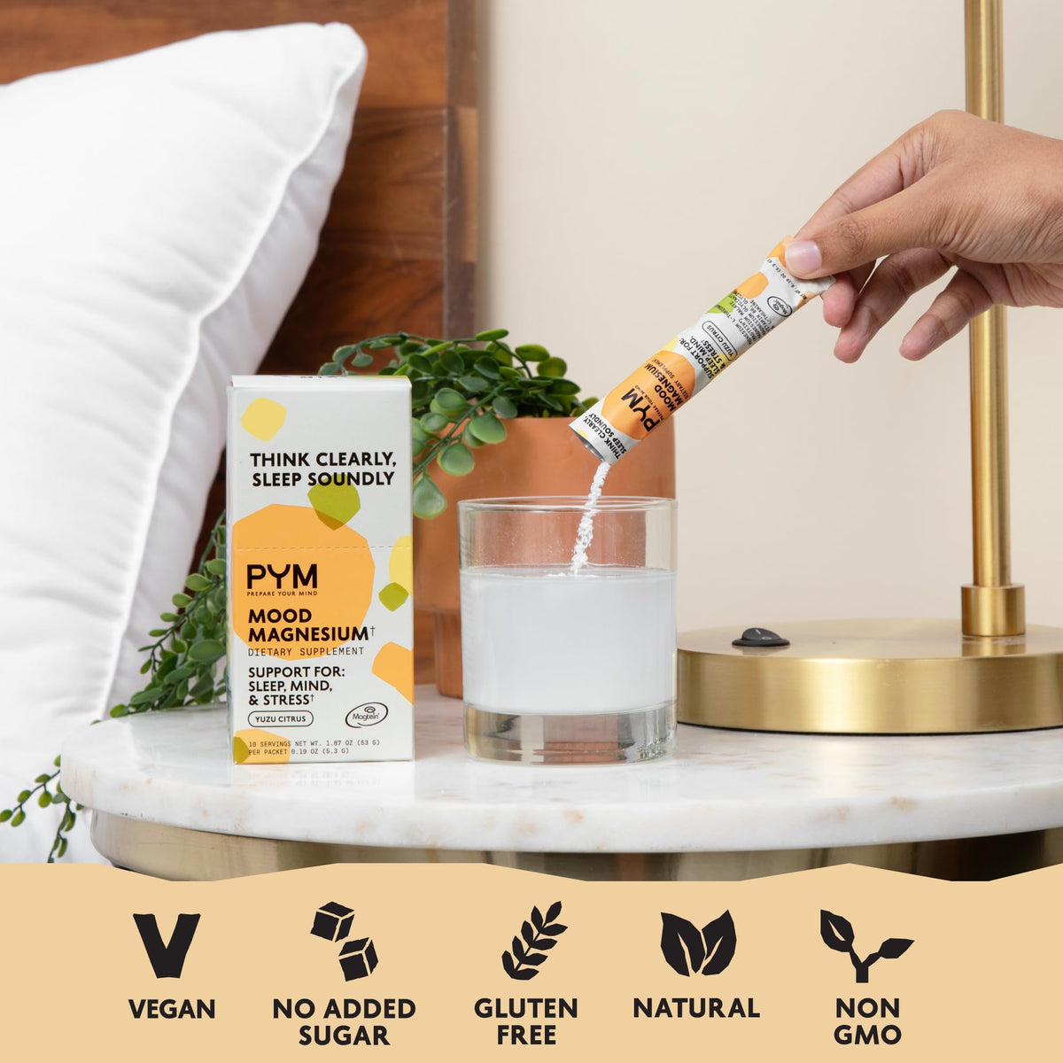 Sachet de PYM Health Poudre de Magnésium Mood avec un verre d'eau