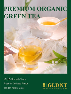 Sachet de thé vert bio GLDNT ouvert avec une tasse de thé