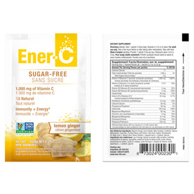 Sachet Ener-C citron gingembre avec des fruits frais en arrière-plan