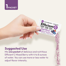 Sachets de Efficient C Mélange de Baies à côté d'un verre d'eau