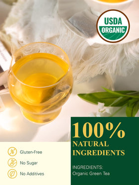 Sachets de thé vert bio GLDNT empilés sur une table