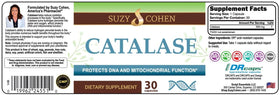 Script Essentials Catalase capsules à côté d'un verre d'eau