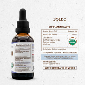 Secrets of the Tribe Boldo Extrait Bio sur une table en bois