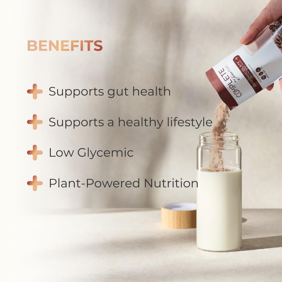 Shakes Complets Juice Plus+ chocolat sur table avec fruits