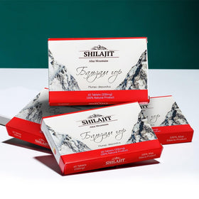 Siberian Green Shilajit 120 Tablettes avec une main tenant le flacon