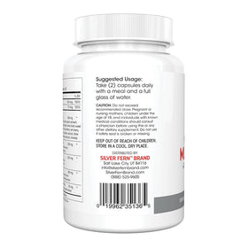 Silver Fern Multivitamines sur un bureau avec des herbes