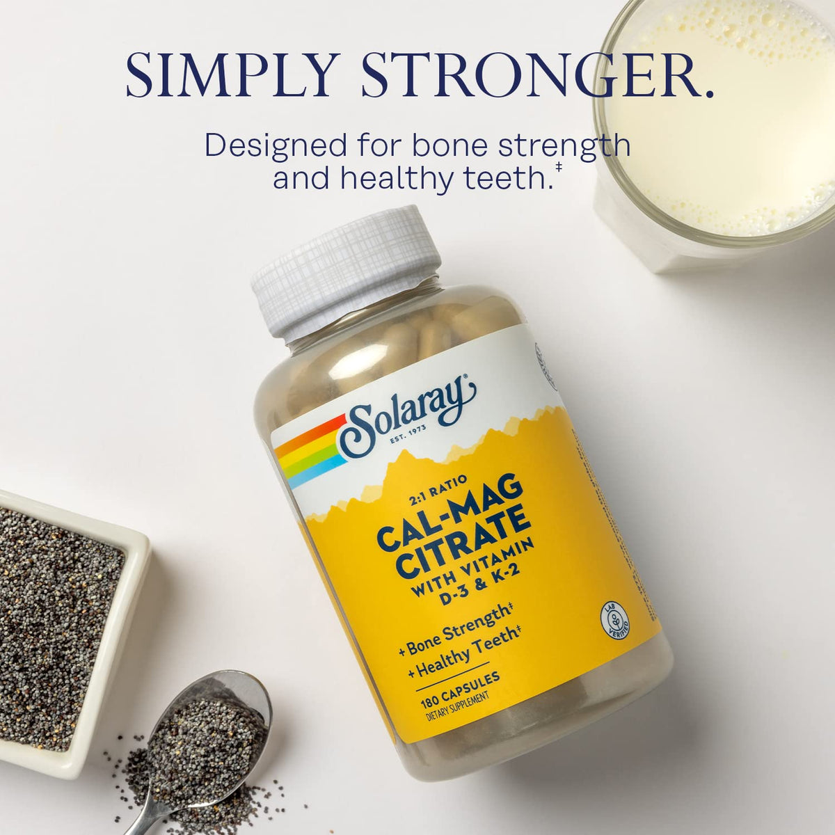 SOLARAY Calcium Magnésium Citrate 2:1 capsules ouvertes sur une surface