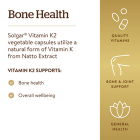 Solgar Vitamine K2 100 mcg capsules végétales sur une table