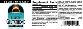 Source Naturals Glutathione Réduit 50 mg comprimés à côté d'un verre d'eau