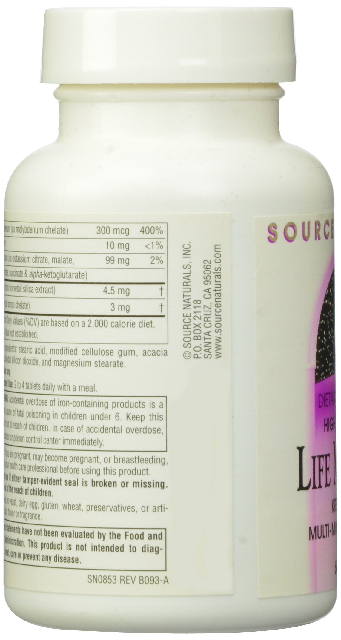 Source Naturals Life Minerals Complex Multi-Multi-Mineral 60 comprimés, à côté d'un bol de fruits