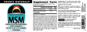 Source Naturals MSM en poudre 141g sur une table avec un verre d'eau