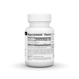 Source Naturals OptiZinc comprimé sur une surface blanche