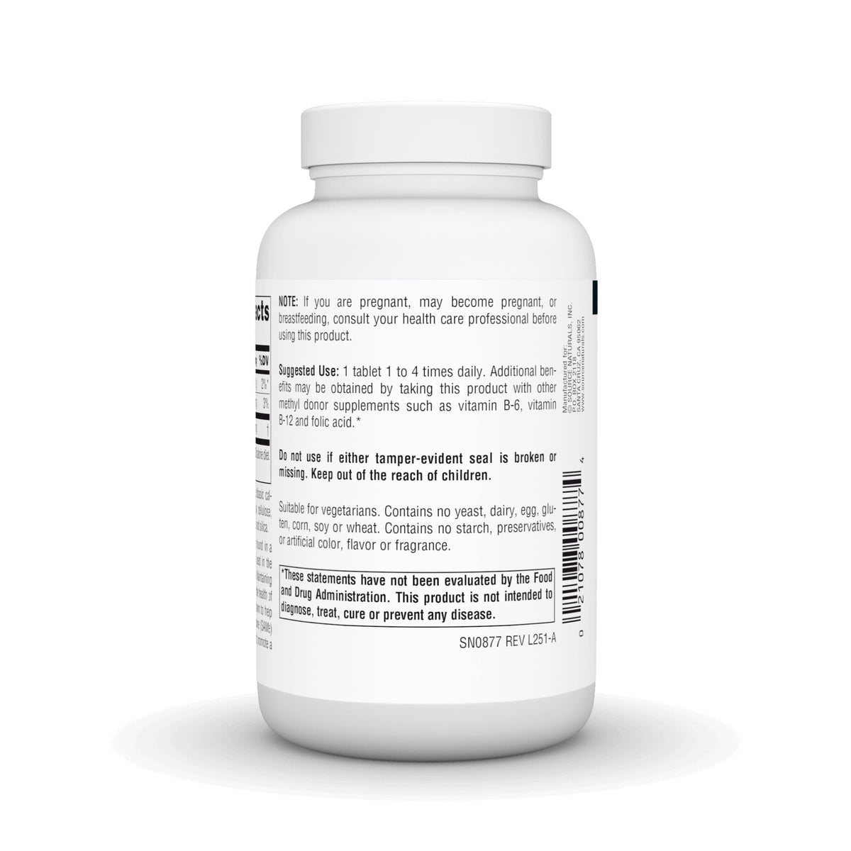 Source Naturals TMG 750 mg comprimés végétariens à côté d'un verre d'eau