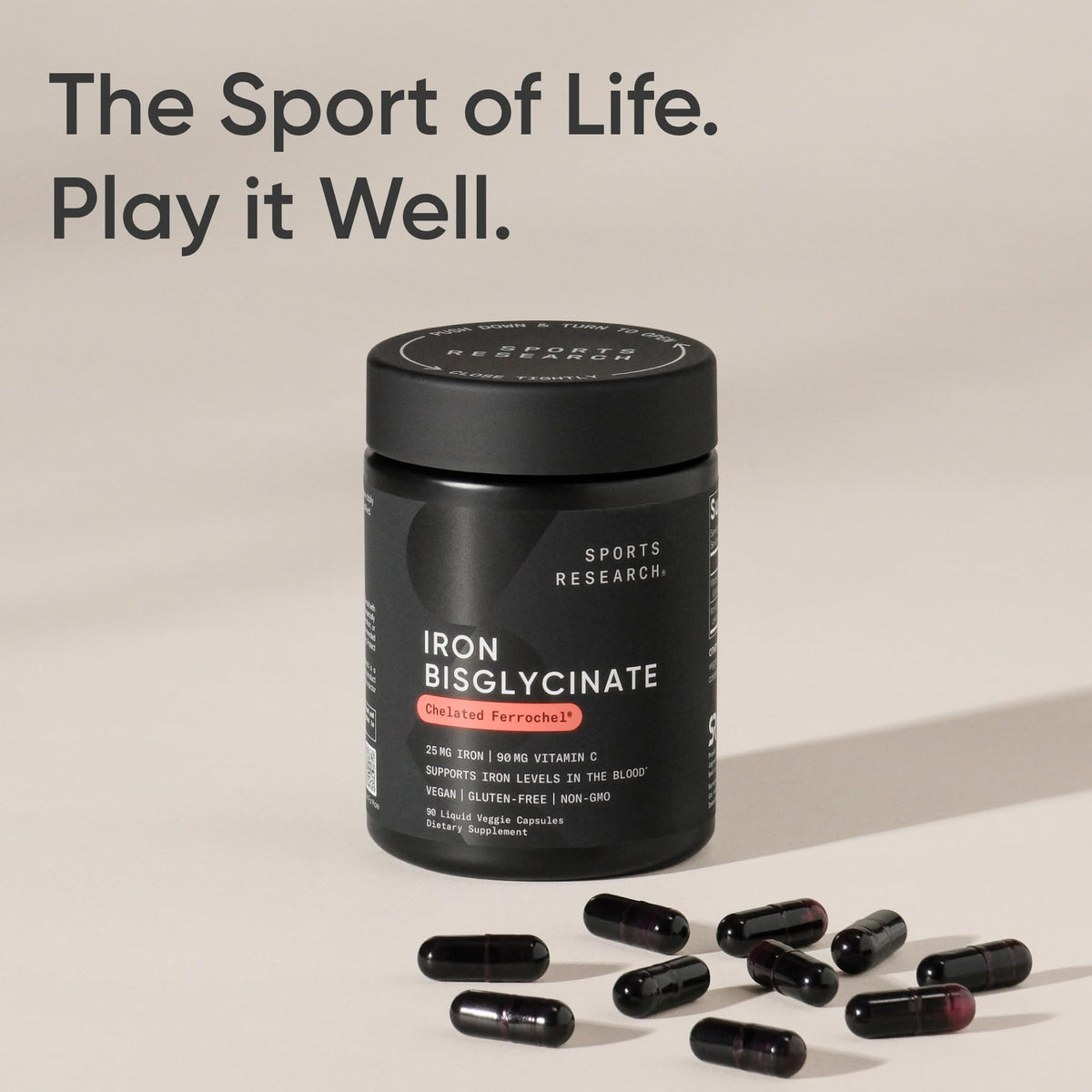 Sports Research Fer 25mg avec Vitamine C avec une main tenant le flacon