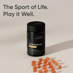 Sports Research Vitamine K2 sur une table avec des aliments
