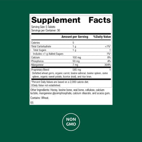 Standard Process Bio-Dent comprimés à côté d'une assiette de fruits