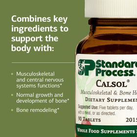 Standard Process Calsol 90 tablettes sur une surface en bois