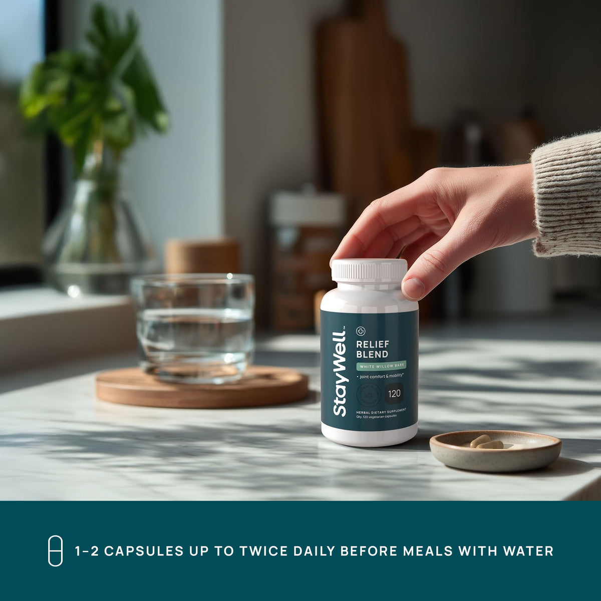 Stay-Well Naturals complément alimentaire 120 capsules à côté d'une cuillère
