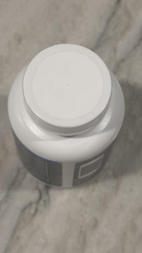 Stellar Labs Multivitamines Végétaliennes pour Hommes, capsules sur une table